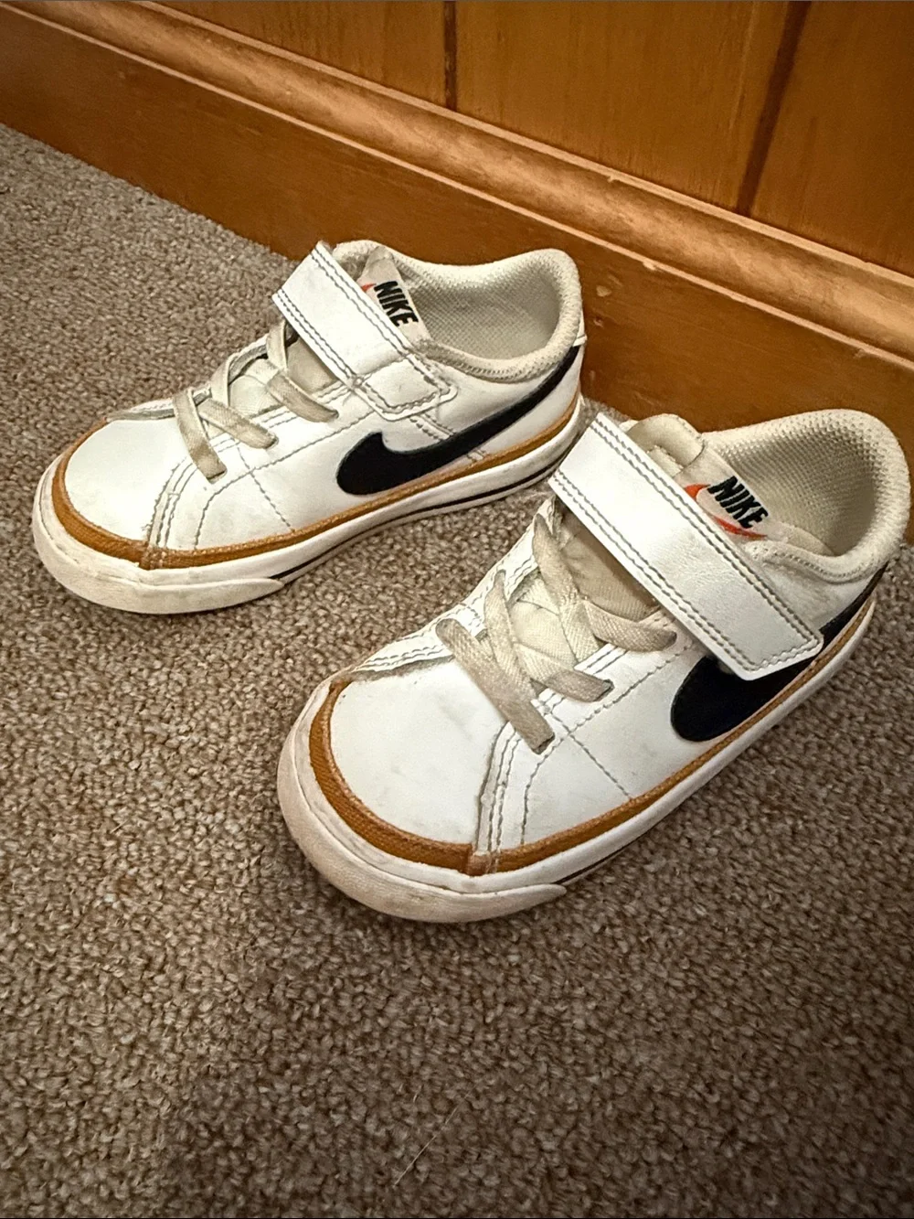 Nike Kids White Sneakers with Black Swoosh and Brown Trim